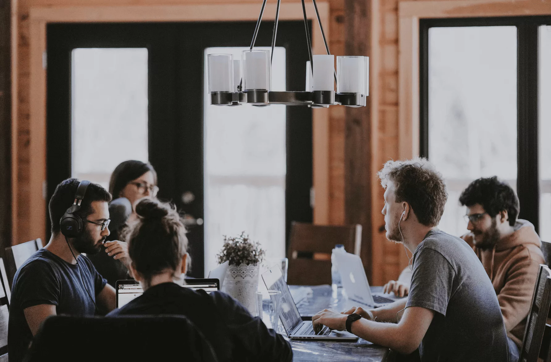 Team discusses work among themselves.